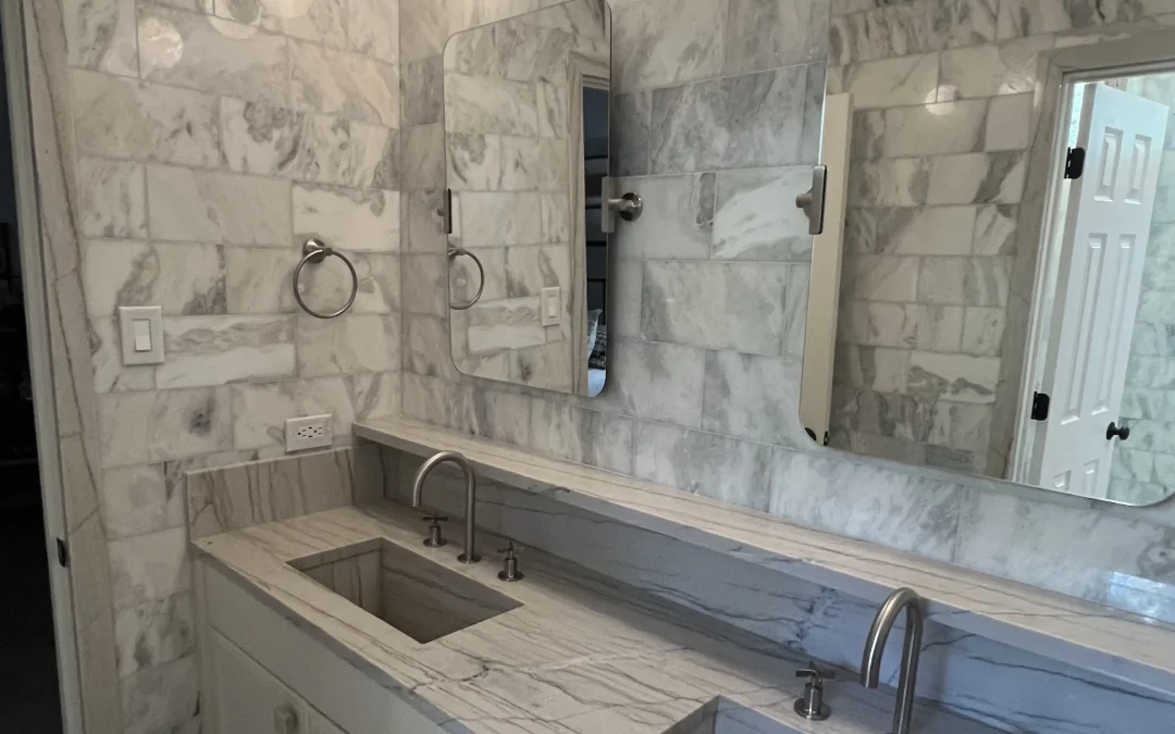 Photo image of custom vanity and marble wall.