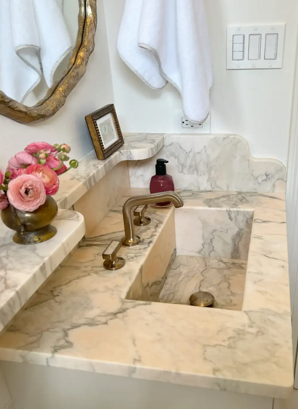 Photo image of gorgeous rose-tone custom vanity.